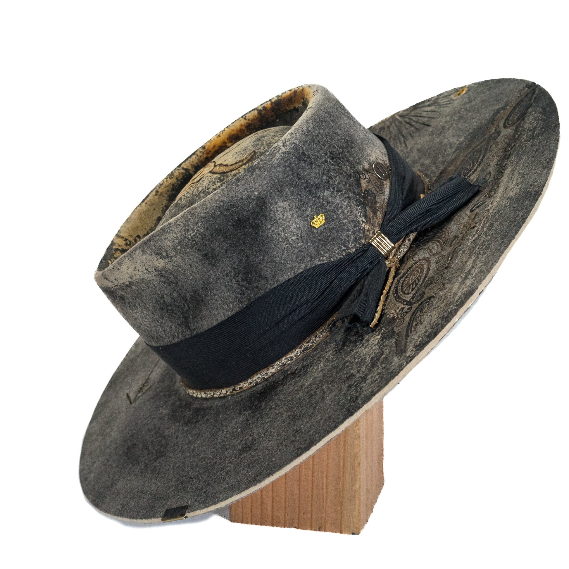 Distressed wide brim fur felt hat showing tall 4.5 inch crown and matte charcoal finish