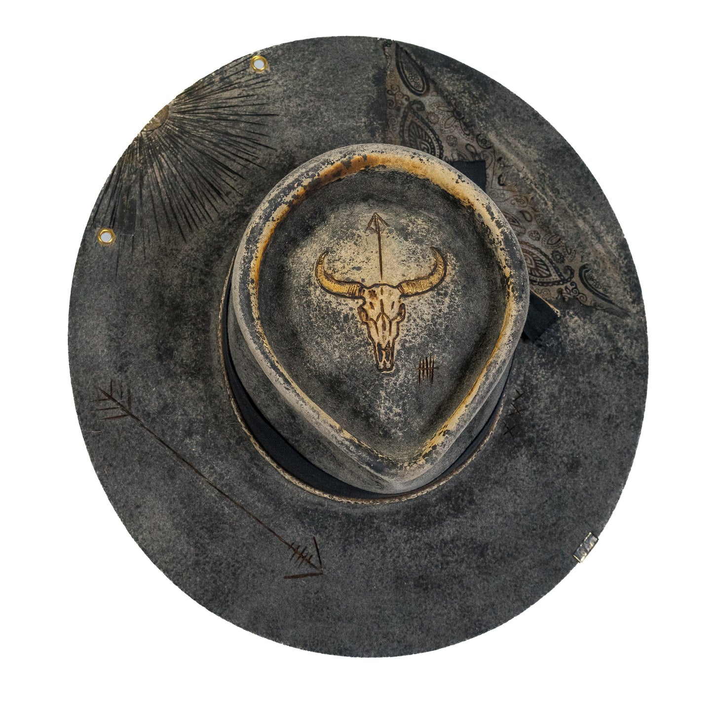 Hand-burned bull skull artwork on distressed wide brim fur felt hat crown