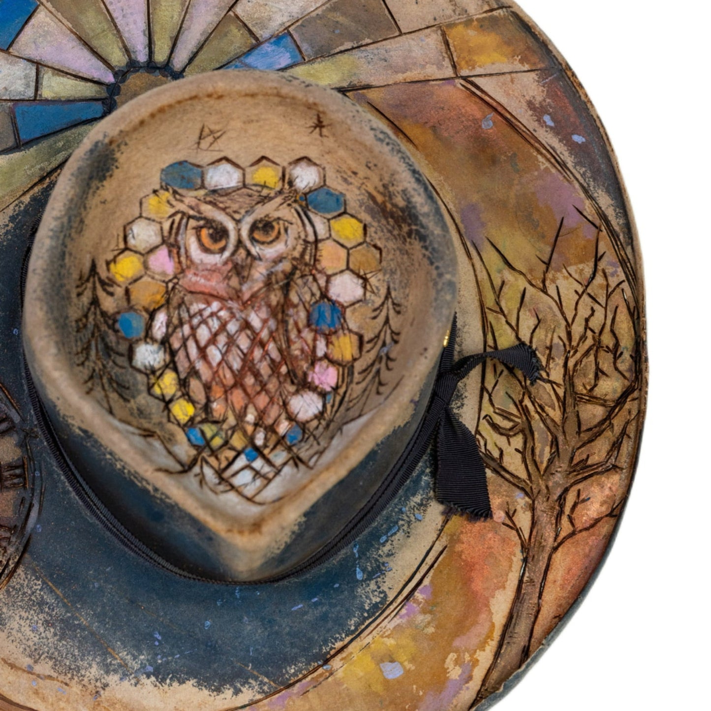 Alder beaver fur felt hat with etched sun and moon imagery along the brim
