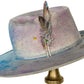Lumen distressed fur felt hat showing curled brim and layered color variation