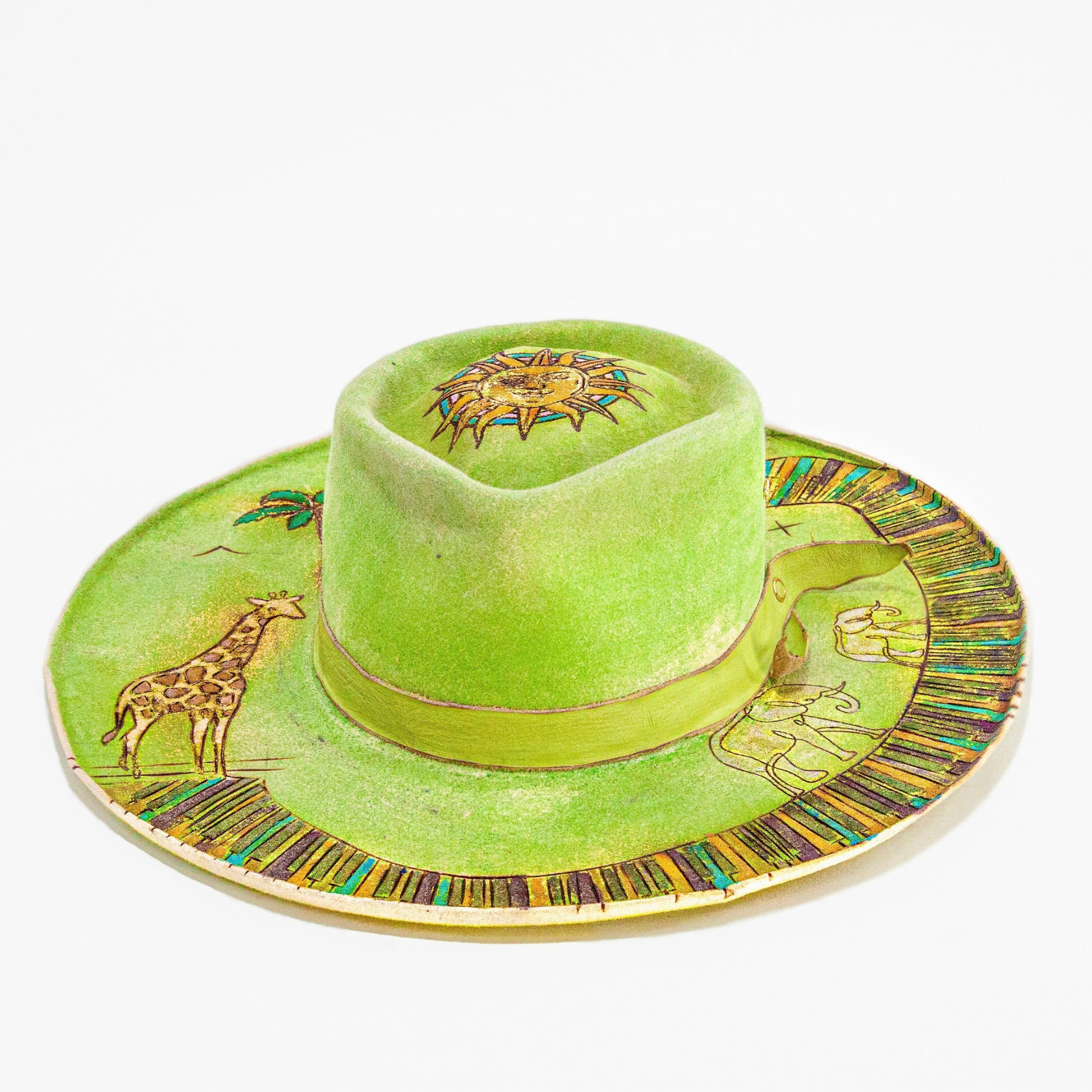 Close-up of distressed rabbit and beaver blend fur felt in lime and chartreuse tones
