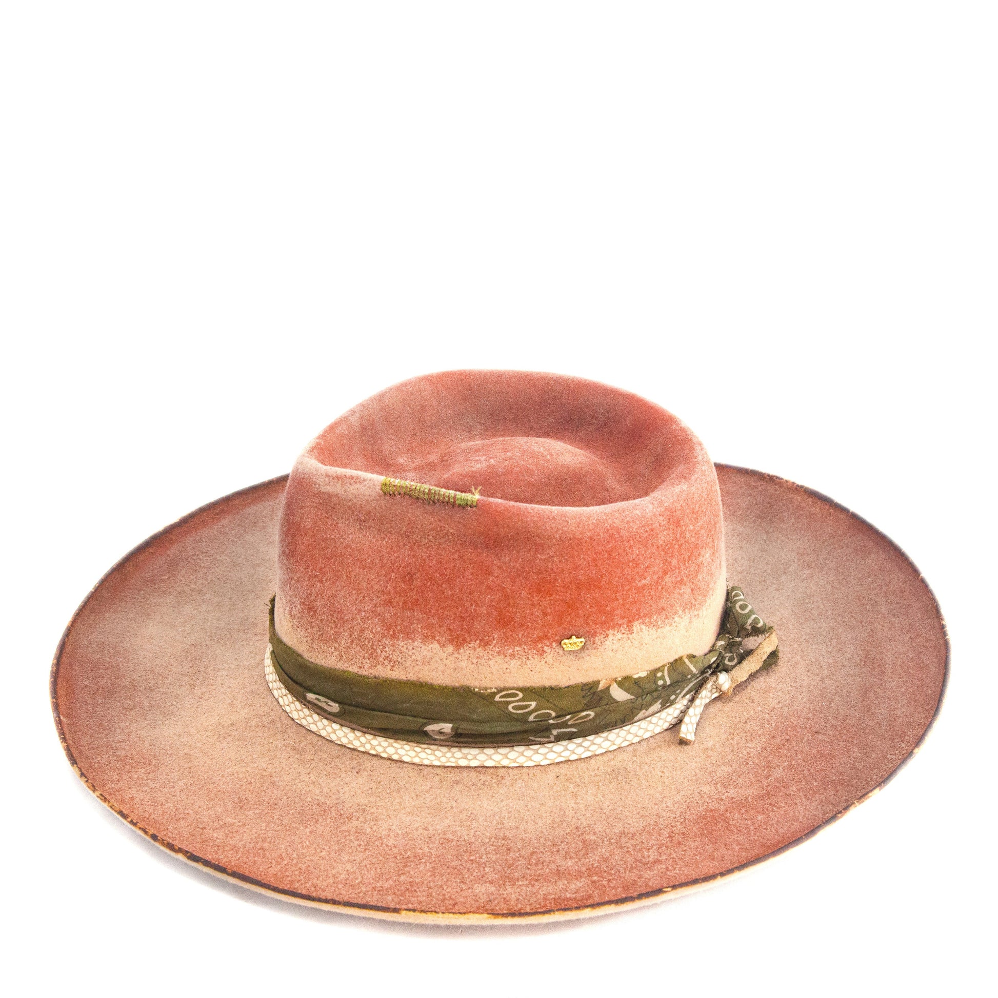 Close-up of distressed rabbit and beaver blend fur felt showing warm clay and amber tones
