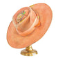 The Paloma Distressed Wide Brim Rabbit and Beaver Blend Fur Felt Hat in coral and peach tones

