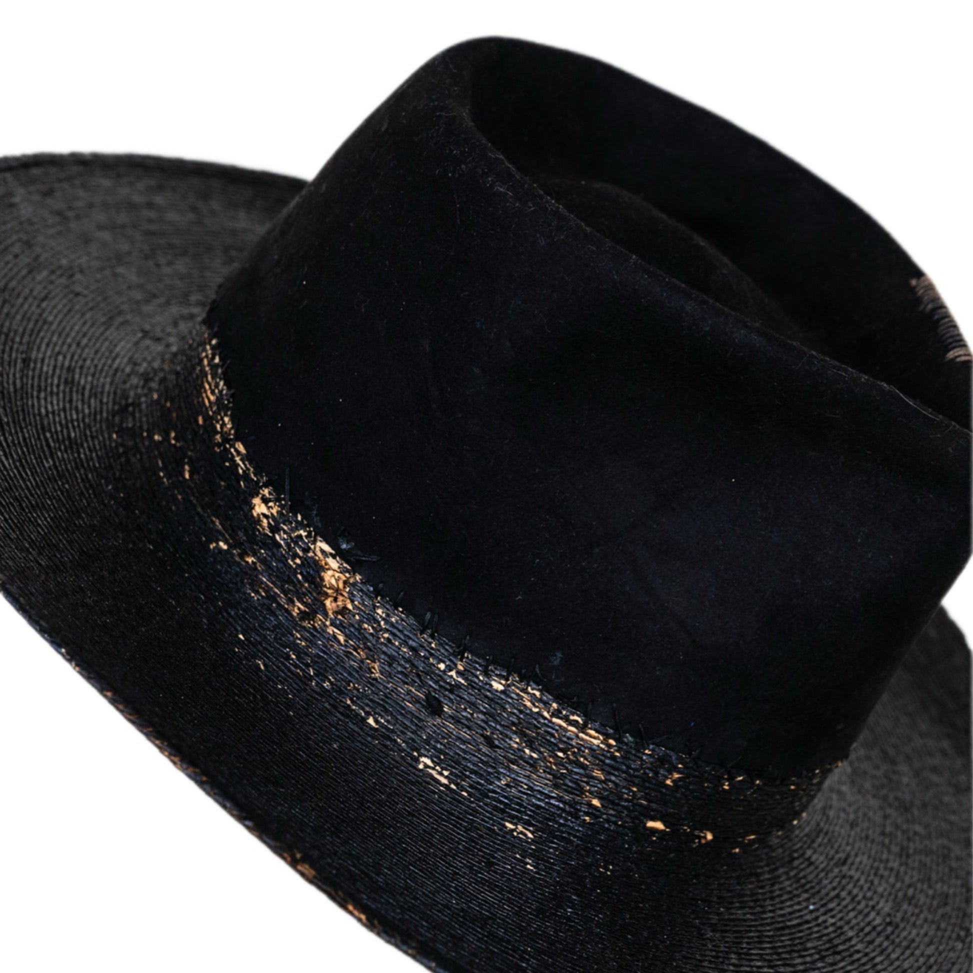 Close-up of distressed brown beaver fur felt texture