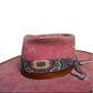 Rosie pink wide brim rabbit fur felt hat styled with neutral layers, ribbon and leather band

