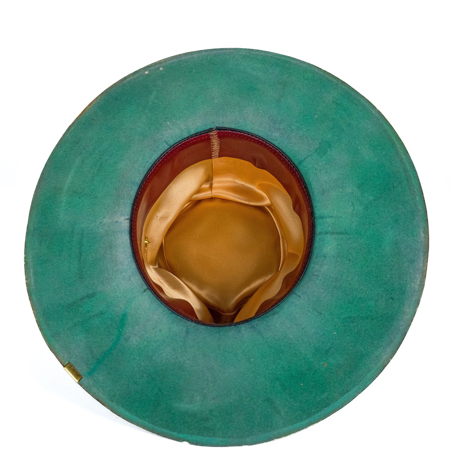 Distressed wide brim fur felt hat interior with gently darkened brim edge
