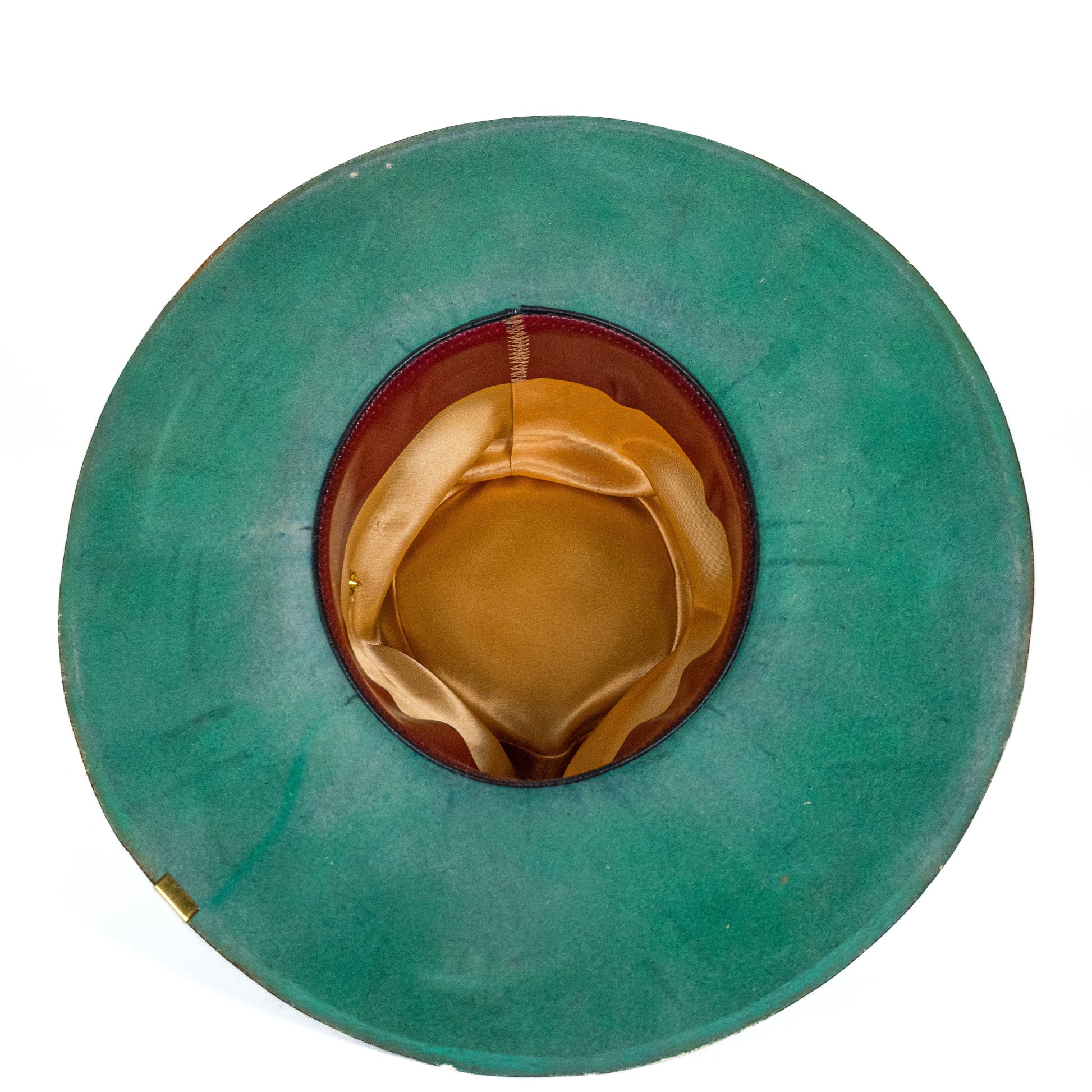 Distressed wide brim fur felt hat interior with gently darkened brim edge
