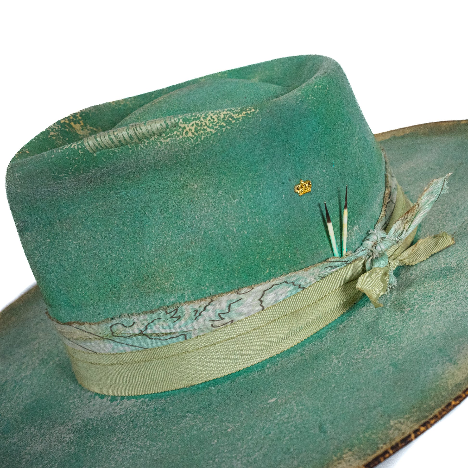 Hand-dyed sage fur felt hat with hand-finished fabric band detail
