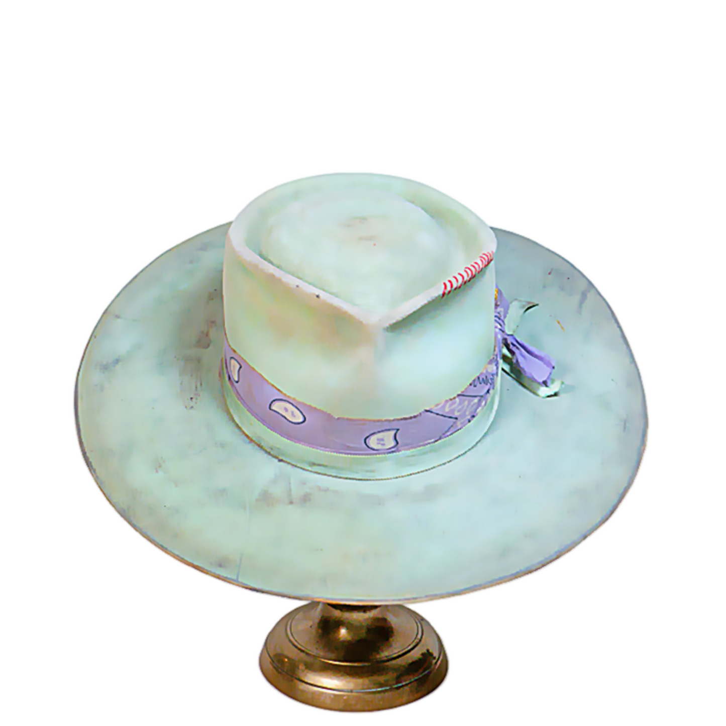 Close-up of lightly distressed fur felt texture in mint and sea-glass tones
